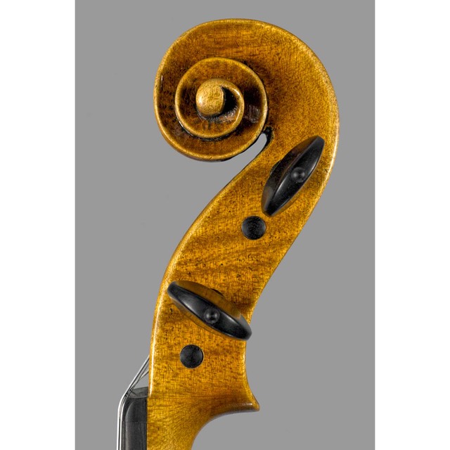 Photo of Late Del Gesu model violin treble side scroll